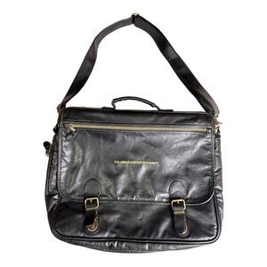 Large leather travel/work bag black with lots of pockets adjustable shoulder str